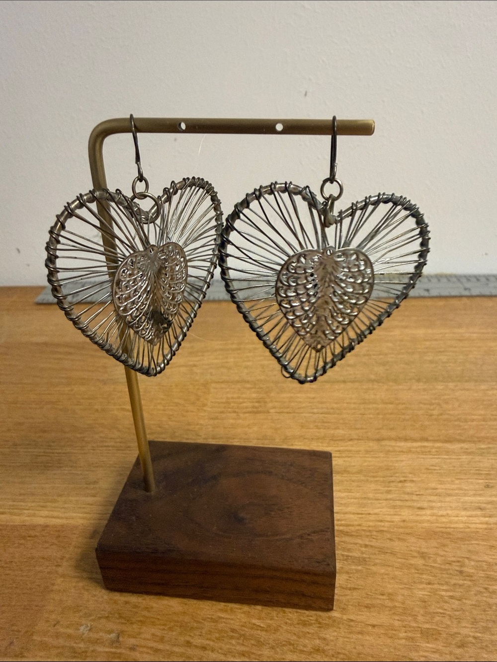Large dangle silver tone heart earrings striated statement wire